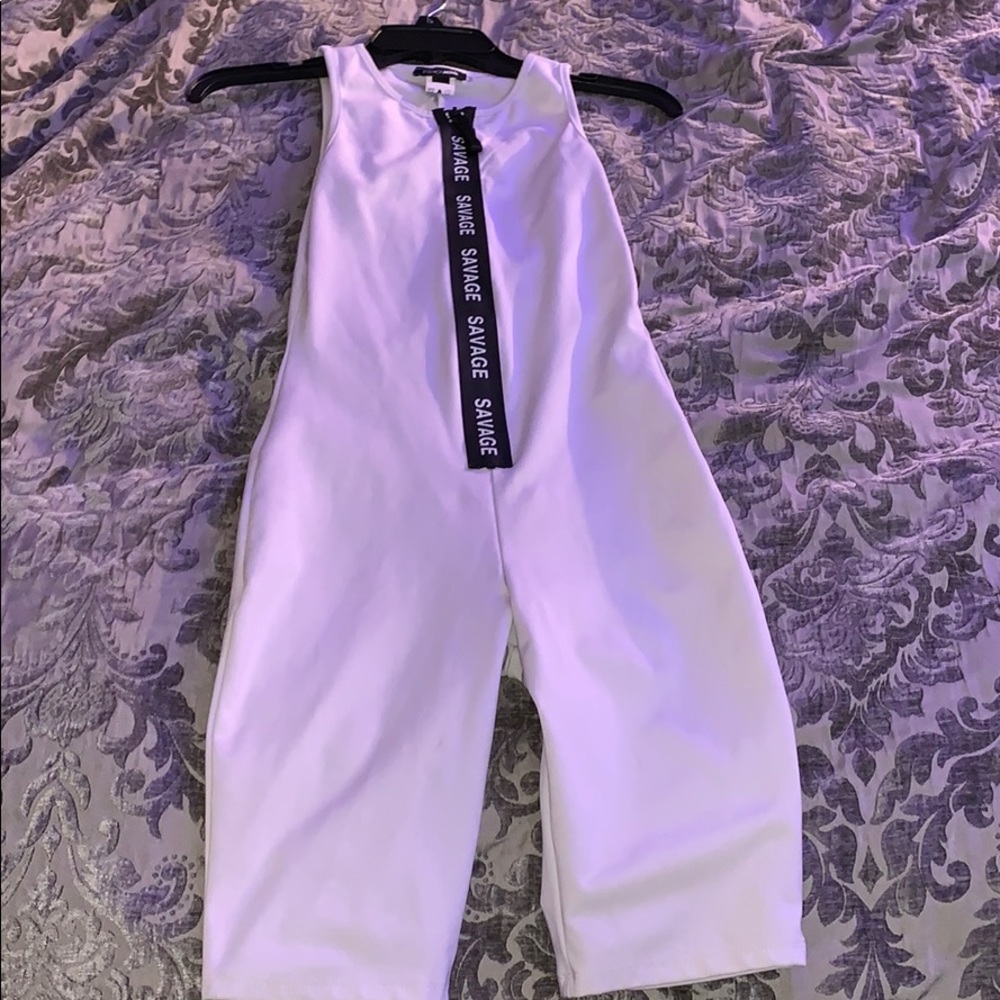White one piece savage print